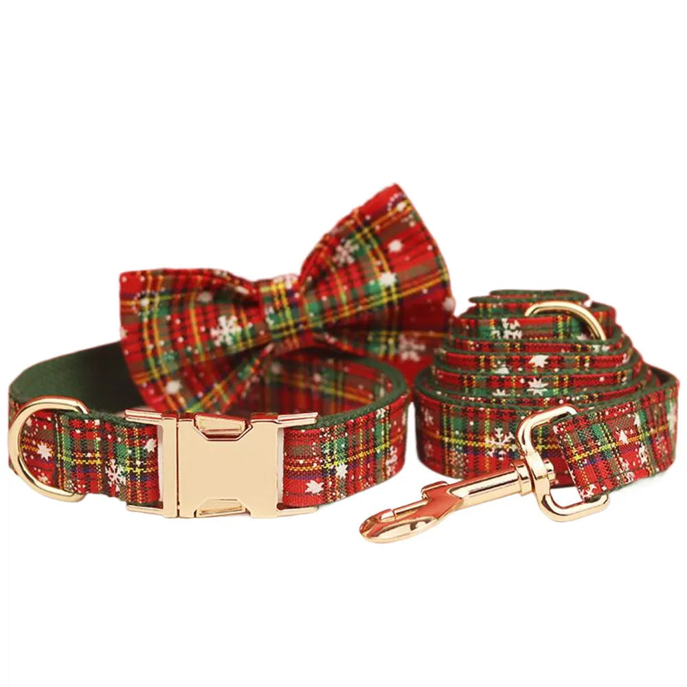 Green background snowflake Christmas pet collar set with leash, bow, and vest