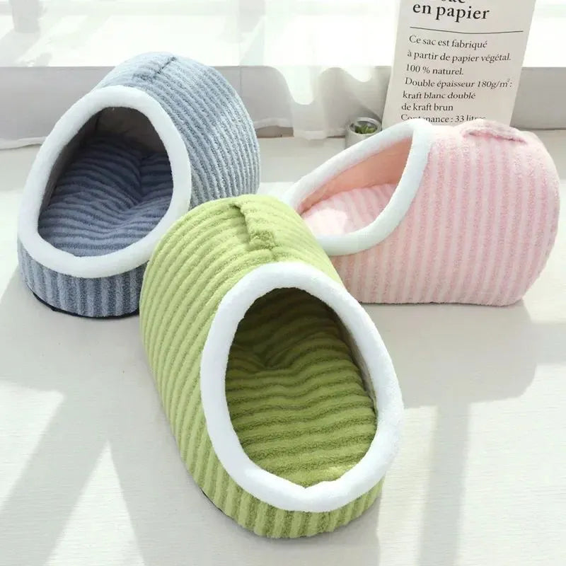 Striped thickened 3D dog bed with enclosed hole design and removable sponge mattress in blue, green, pink, or yellow.