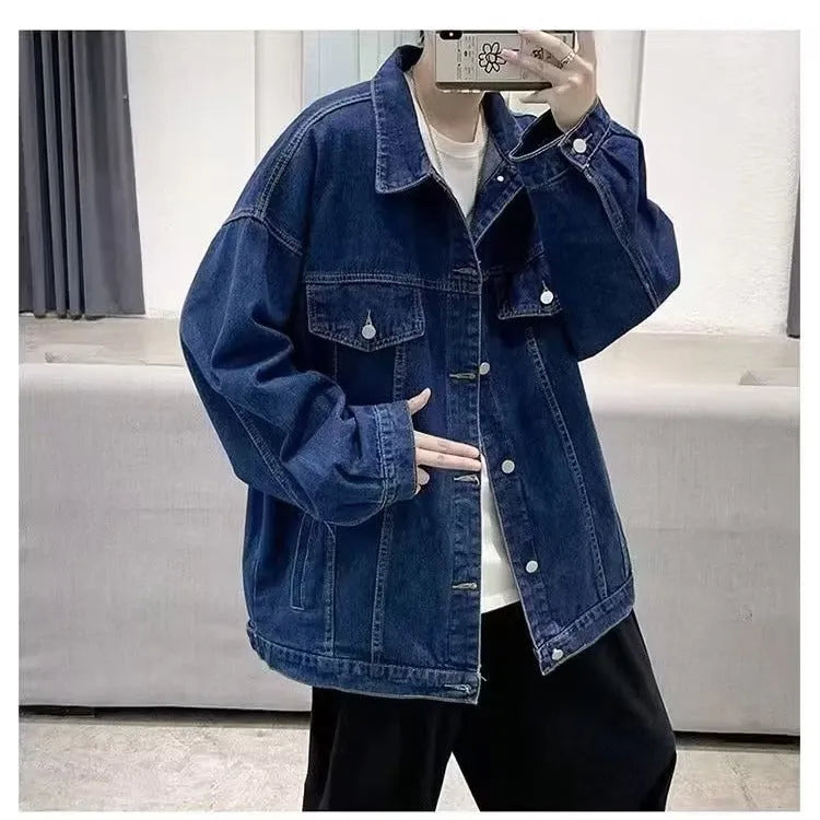Loose-fitting denim jacket in dark blue, light blue, or black with long sleeves and straight hem, sizes M-3XL