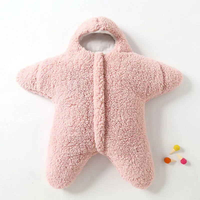 Cashmere and cotton baby sleeping bag with hood, shown in pink, grey, light blue, or khaki.