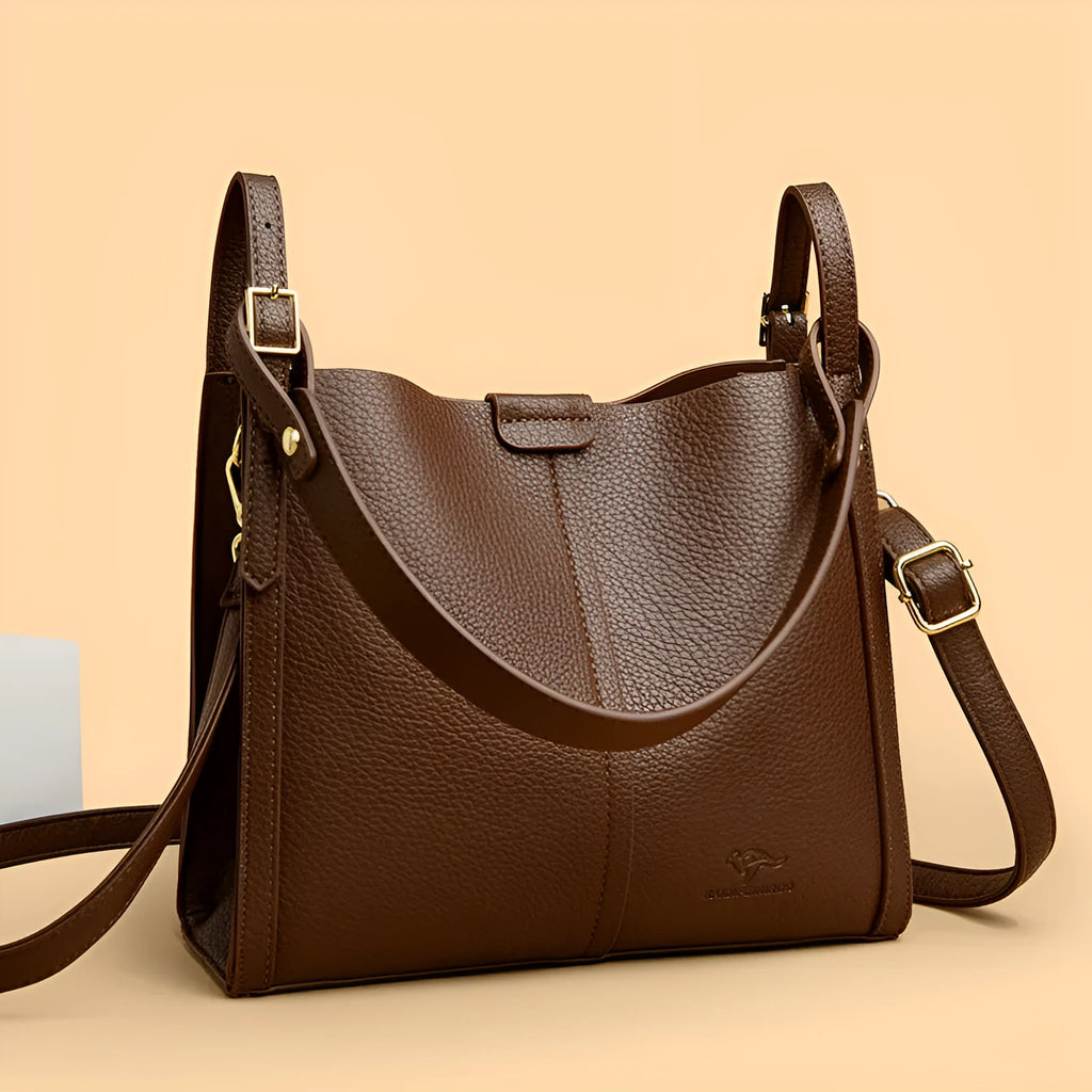 Retro-style ladies shoulder bag in soft PU material with internal organisers and single strap