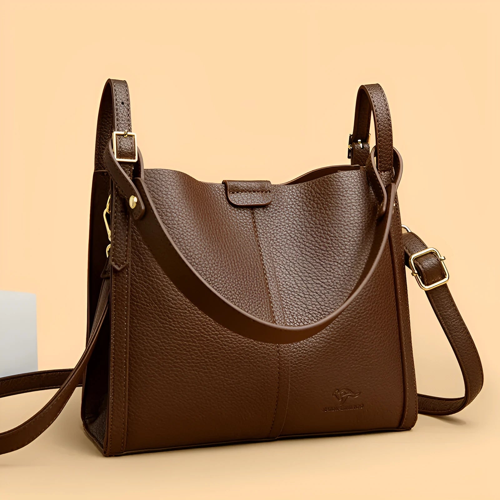 Retro-style ladies shoulder bag in soft PU material with internal organisers and single strap
