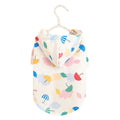 Colourful cartoon umbrella pattern dog raincoat in size L laid flat.