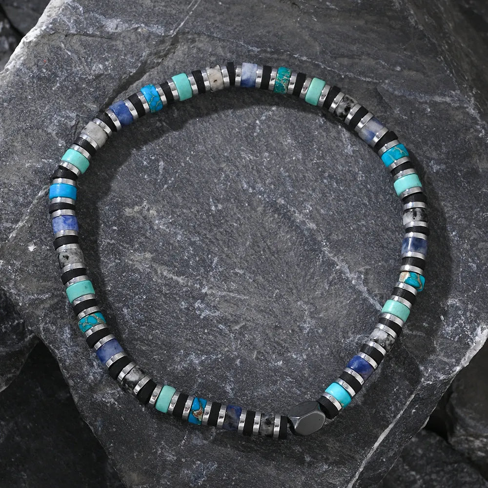 Hand-woven cylindrical bracelet made from natural semi-precious stones in a Bohemian style.