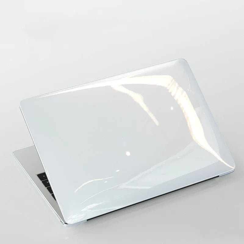 Black PC hard shell protective case for a MacBook Pro laptop