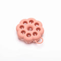 Silicone pet grooming brush with flexible pins and ergonomic handle in assorted colours