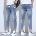 Men's denim stretch casual trousers in dark blue, cropped length, horn leg opening, size 5XL