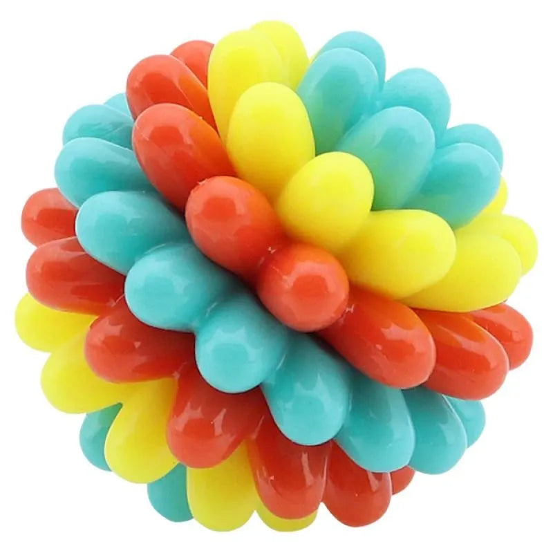 Multicolour durable rubber dog teething ball in red yellow and teal for dental cleaning and interactive play