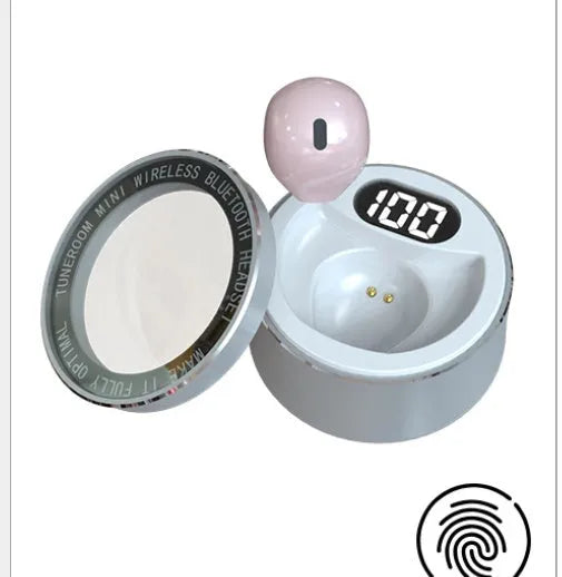 A tiny 9mm skin-coloured Bluetooth earphone sitting on a fingertip, showcasing its invisible design.