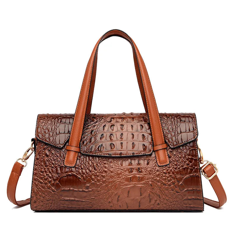 Soft leather messenger bag in horizontal square design with single shoulder strap