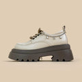 White women's Mary Jane platform shoes with chunky heel and front lace-up.
