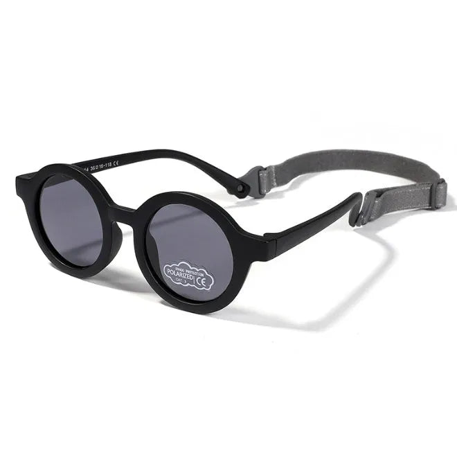 Children's silicone sunglasses for 0-3 year olds with round frame and polarized lenses in multiple colour options