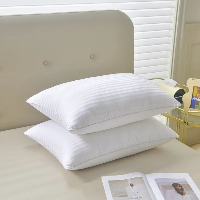 White cotton pillow with a thin satin stripe, showing feather cotton filler and three size options.