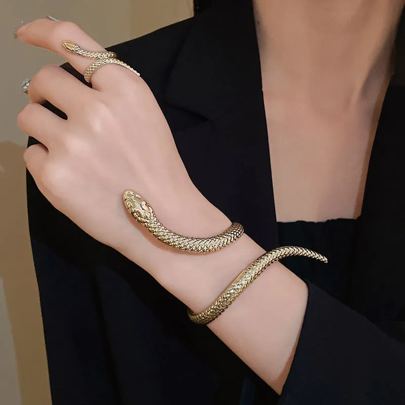 Gold electroplated metal exaggerated twisted winding snake ring and bracelet jewellery set