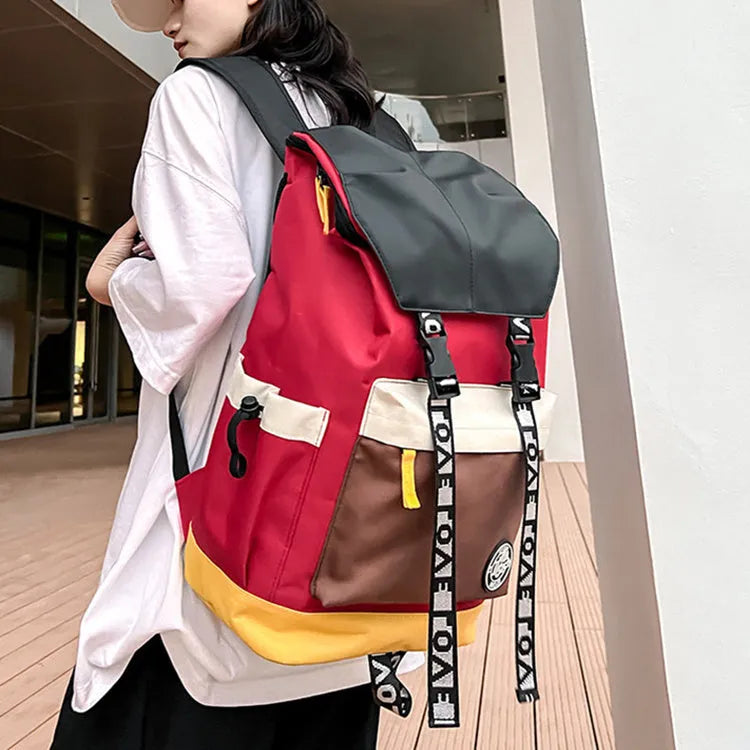 Oxford cloth backpack in black, green, or red, showing handheld and shoulder strap carry options