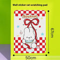 Vertical felt cat scratch board in Happy Kitten pattern mounted on a wall