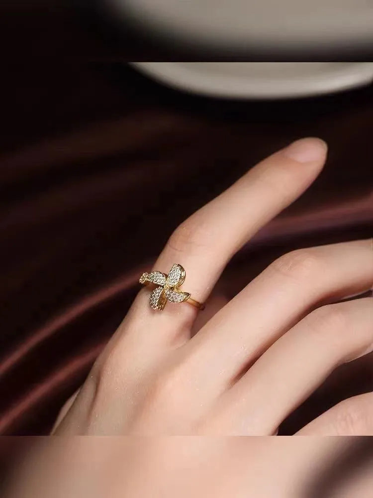 Rotating micro inlaid windmill ring in gold or silver electroplated copper