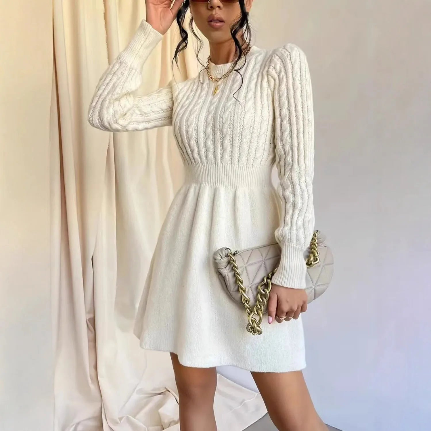 Korean-style waist-defining dress with round neck and twisted knit base in cream colour