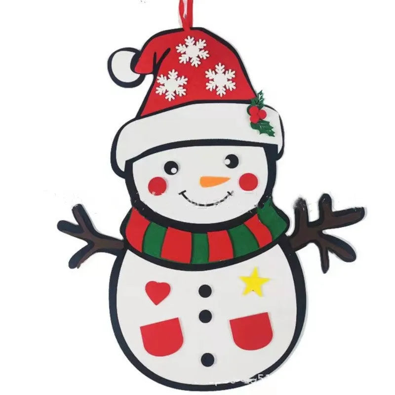 Green DIY felt Christmas tree with fairy lights and ornaments on a white wall with decorations attached