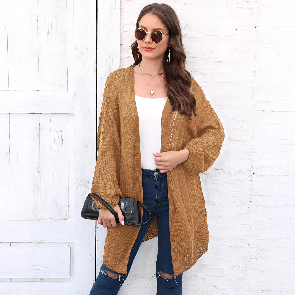 Loose-fit women's acrylic sweater coat in army green, shown on a hanger.