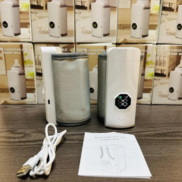 Grey and white portable car charger electric milk warmer for baby bottles.
