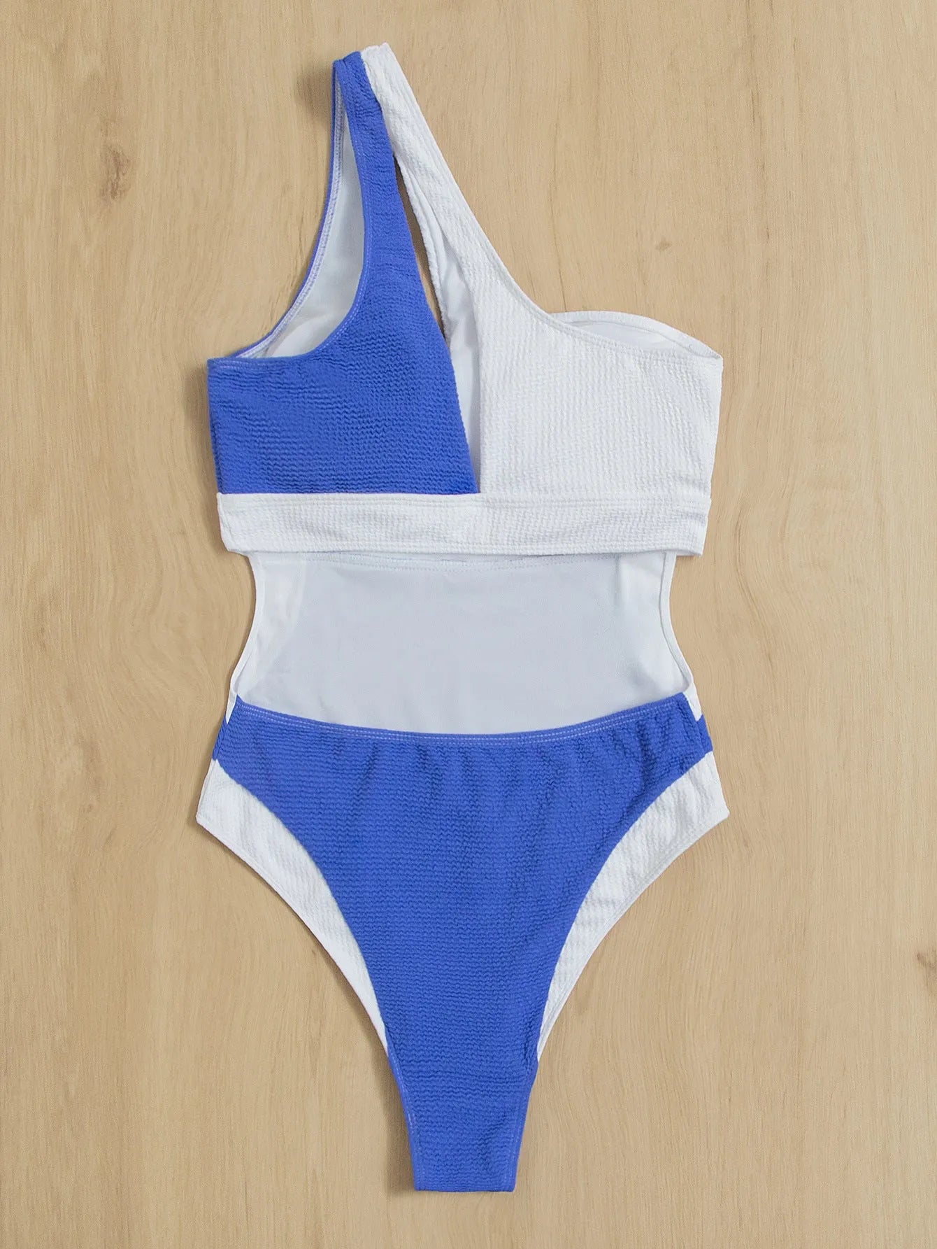 One piece colourblock swimsuit in blue and white, ladies bikini style with chest pad, polyester fabric.