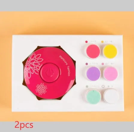 Red and green baby electric nail polisher sets with multiple grinding heads for infant and adult nail care.