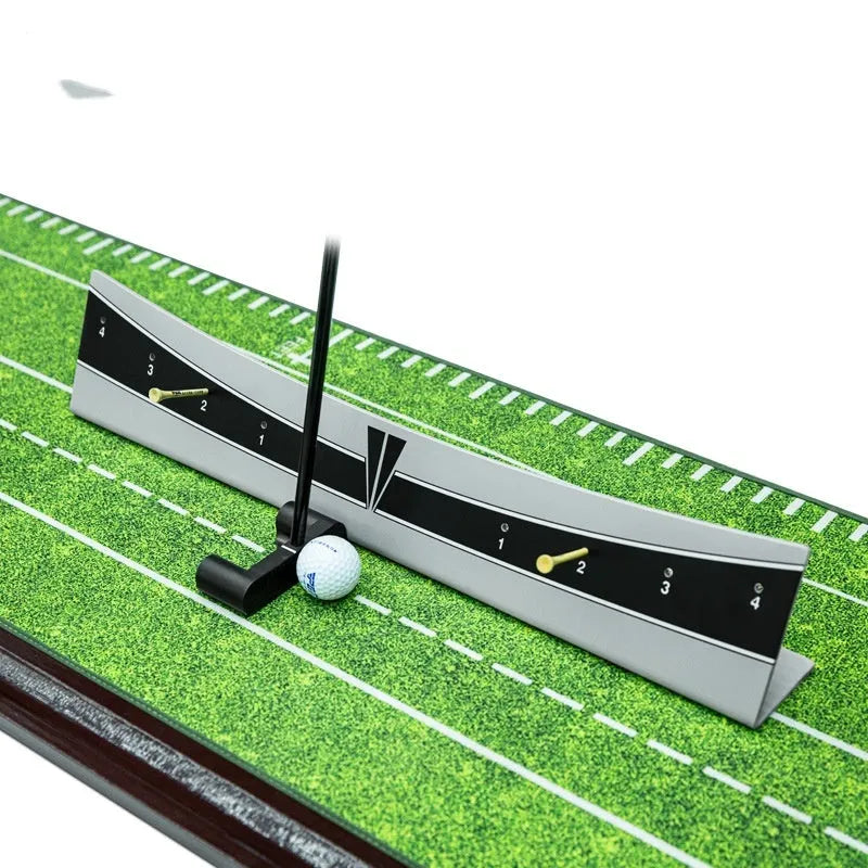 Golf putter with attached adjustable balance simulator showing the extended push rod mechanism on a putting mat.