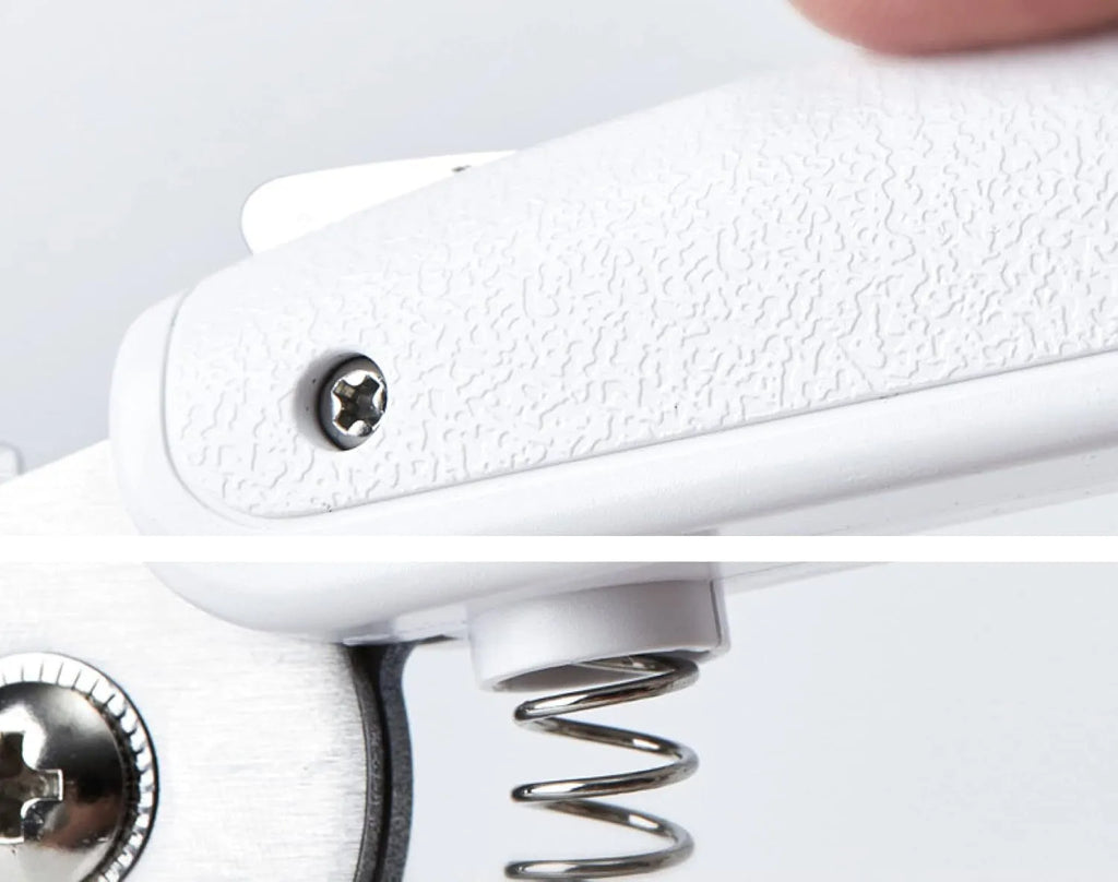 White pet nail clippers with LED light, transparent anti-splash guard, and triangular blade for cats and dogs