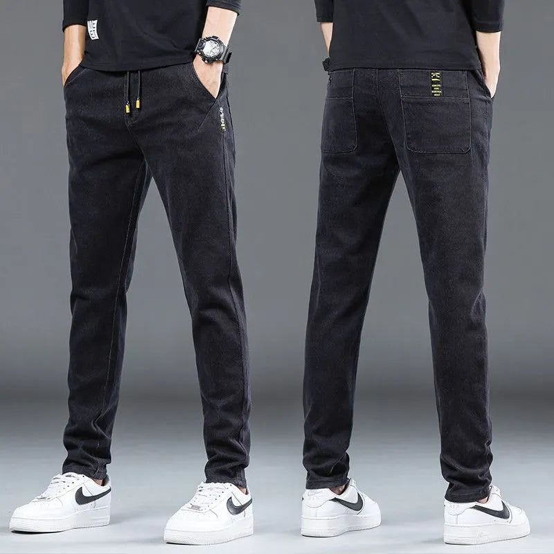 Men's denim stretch casual trousers in dark blue, cropped length, horn leg opening, size 5XL