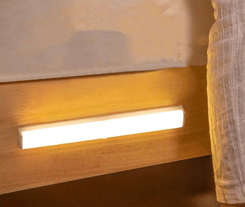 Black and white battery-operated LED strip light with body motion sensor in various lengths.