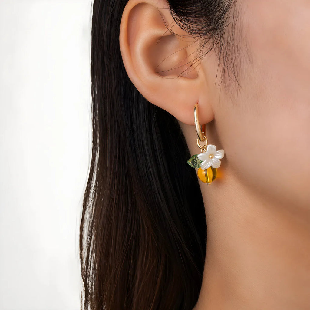Yellow acrylic bee shaped earrings for women with honey fruit design and electroplated finish, Korean style pair