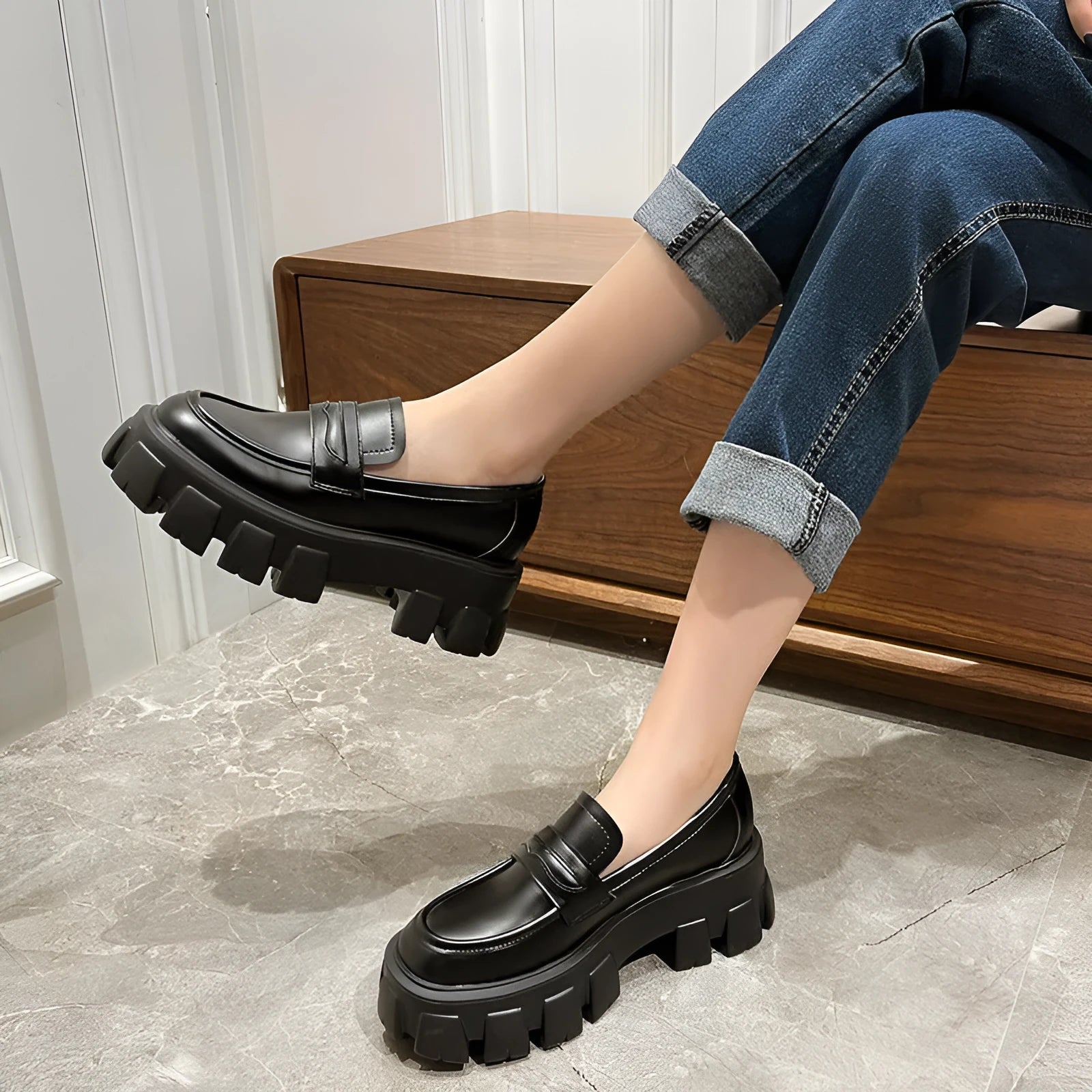 British style wide fit patent leather loafers with a muffin heel and rubber sole.