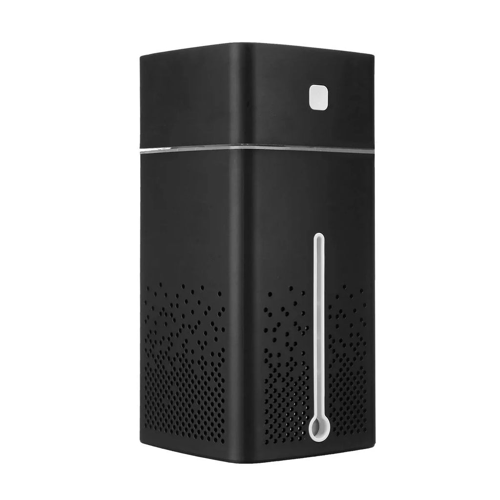 Black and white USB desktop humidifier with 1000ml water tank on a desk.
