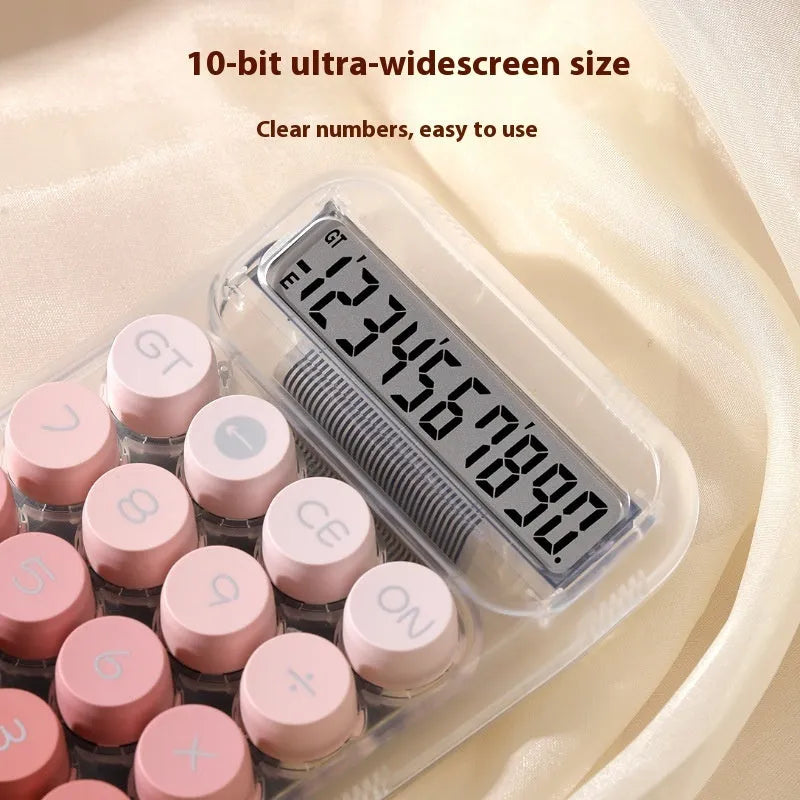 Gradient colour round mechanical keyboard calculator in muted blue, green, pink, or purple on a desk.