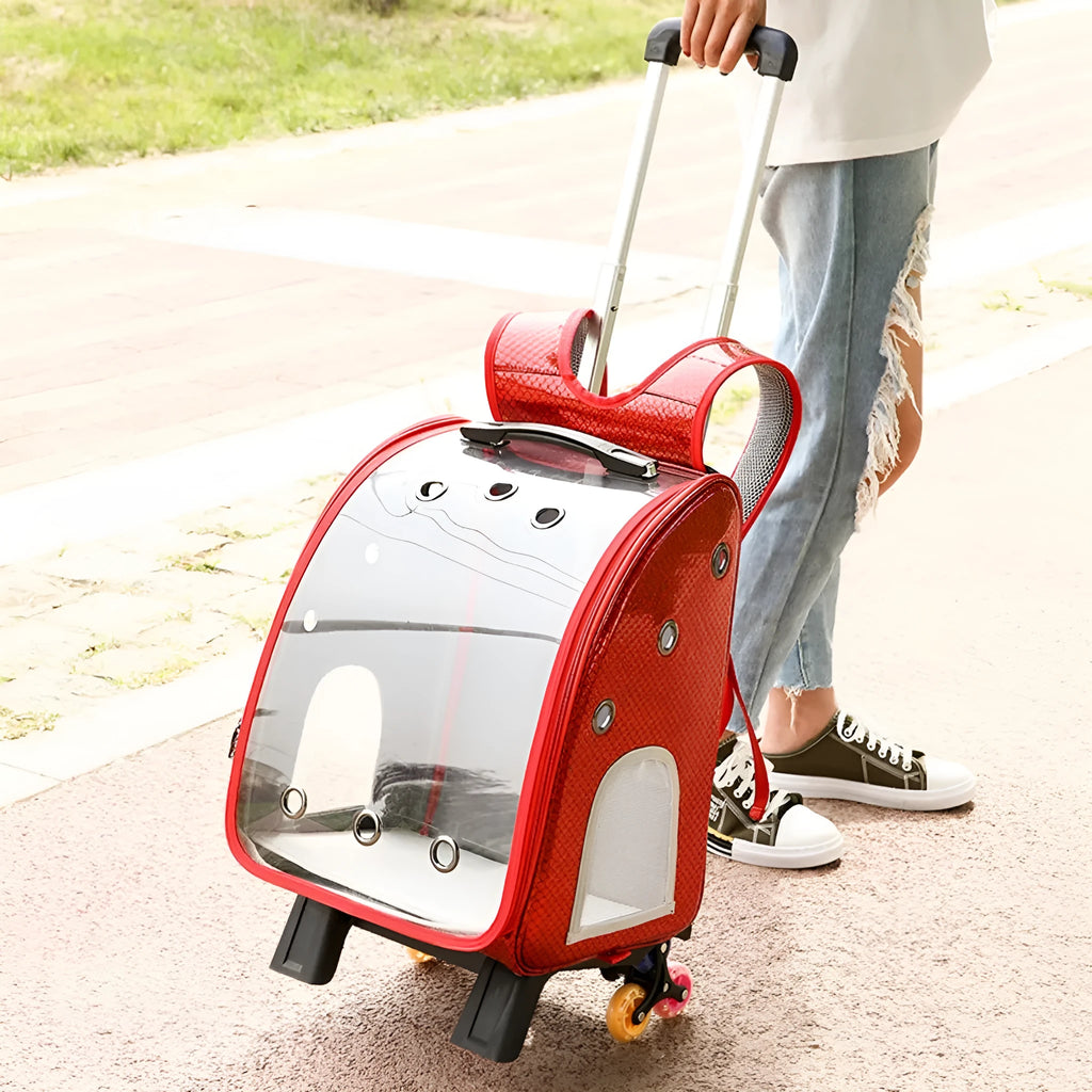 Blue transparent folding pet trolley bag with shoulder straps and a clear acrylic pet compartment.