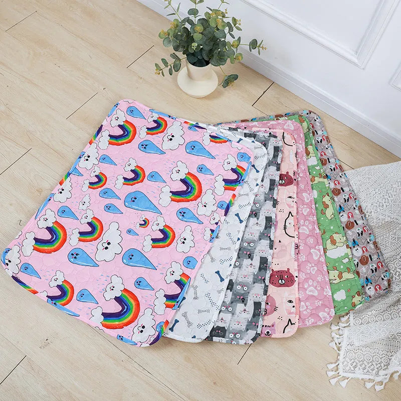 Reusable waterproof pet training pad showing animal print design options and size variations