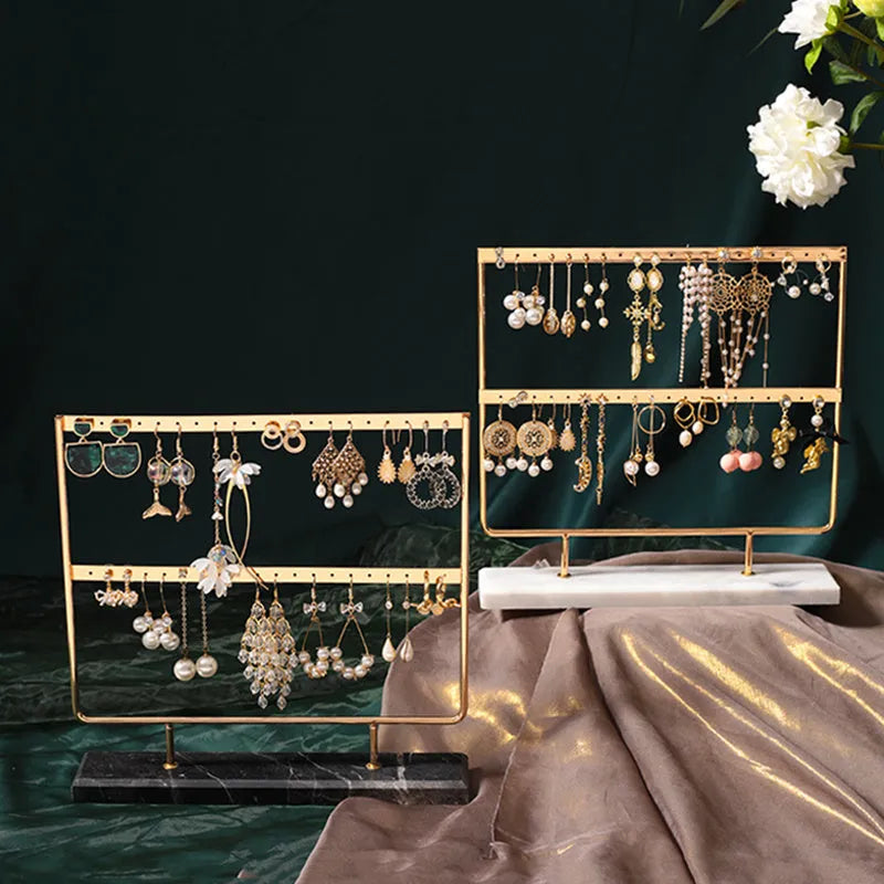 Alloy earring storage rack in green or white for organising earrings on a dressing table or shelf