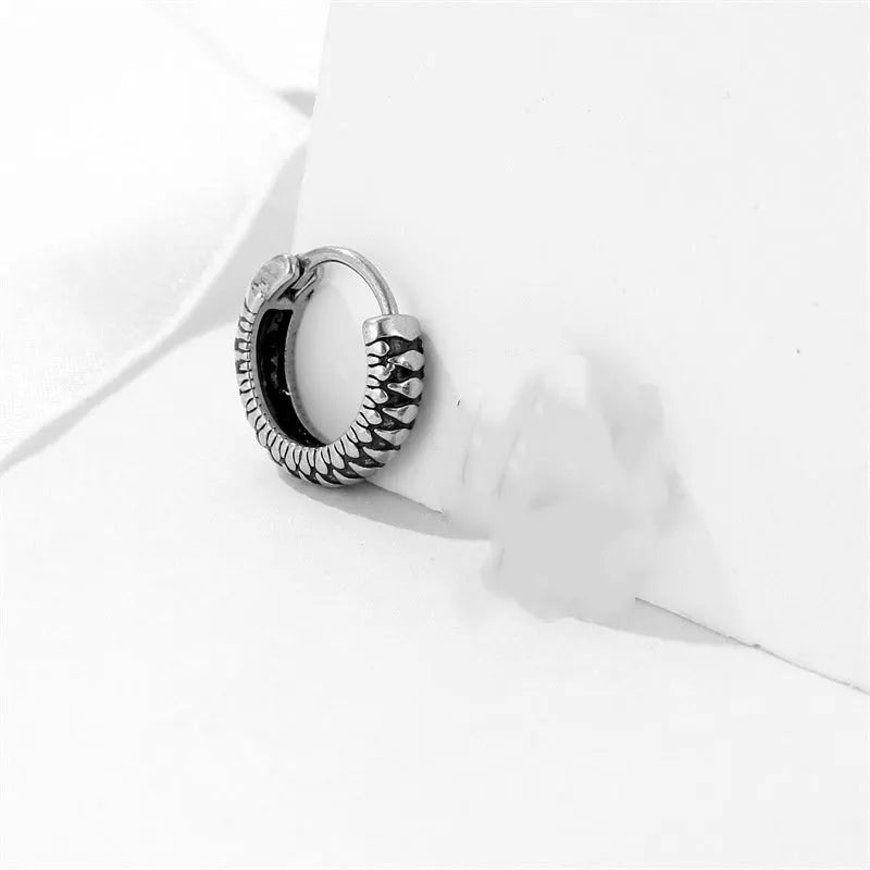 Silver retro twist geometric earrings with stripes pattern, made from titanium steel alloy.