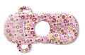 Pink plush baby feeding pillow on a carpet, showing its 30cm by 42cm size and soft texture.