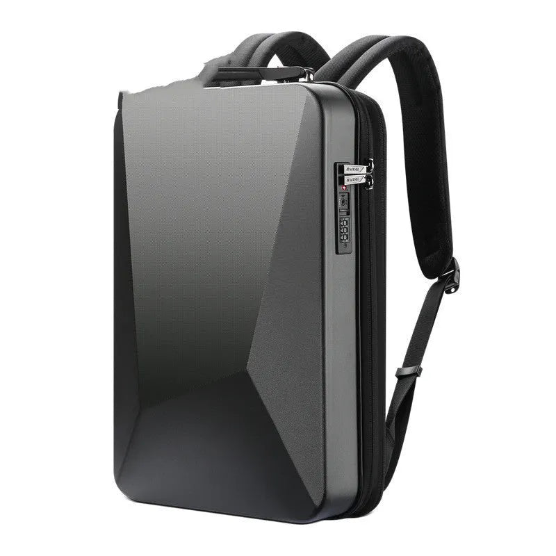 Men's hard-shell titanium silver backpack with lock, open to show laptop compartment and internal organisation pockets.