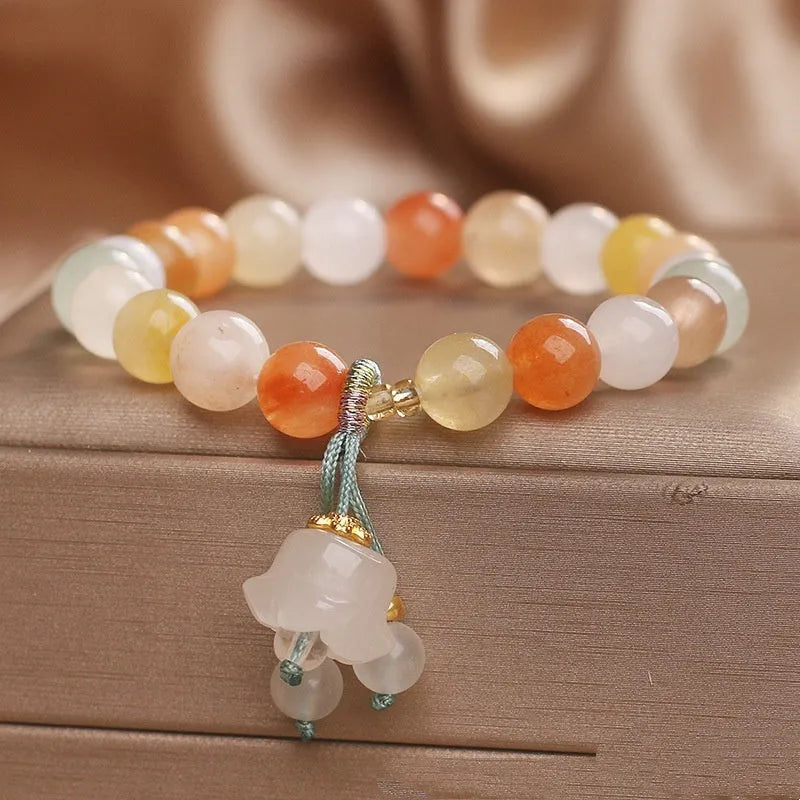 Natural Jinsi Jade beaded bracelet for women with round beads and lily pendant in jade colour