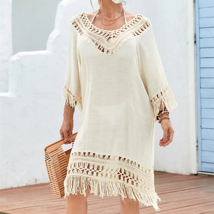 Apricot women's crochet knitted patchwork dress with half sleeves on a mannequin