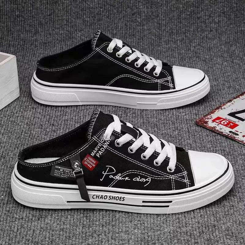Men's canvas slip-on sports casual shoes in black with round toe design and letter pattern detail