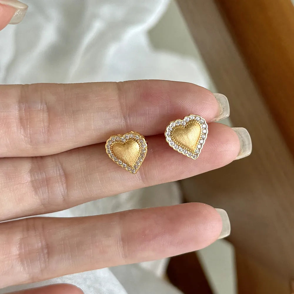 925 silver heart-shaped stud earrings 11.3x11.5mm white finish on ear
