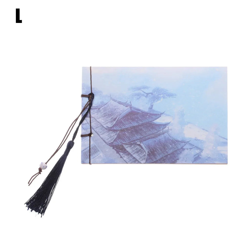 Hand-stitched kraft paper notebook with a tassel bookmark, shown in a natural colour.