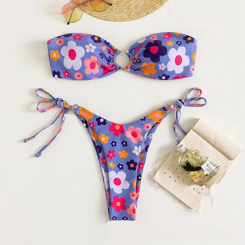 Women's pink polyester bikini set with tube top and briefs on a mannequin