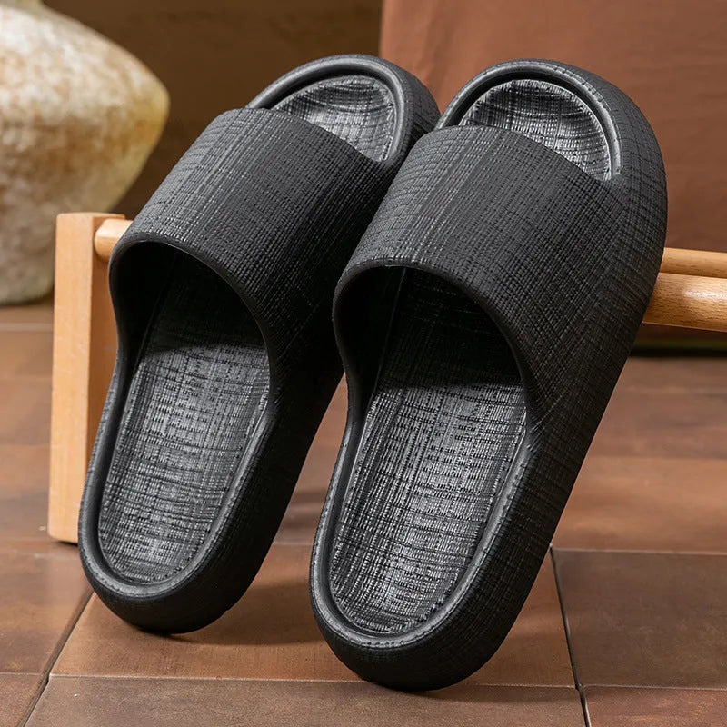 A pair of EVA toe ring slippers in a chosen colour, showing the soft non-slip sole and strap design.