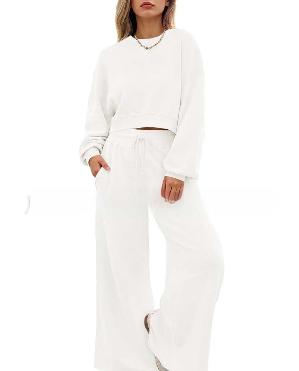 Women's solid colour two-piece set with long sleeve top and matching trousers in polyester fabric