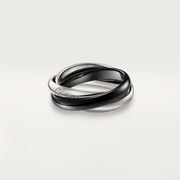 Set of three sterling silver rings with full band of diamonds, showing gold rose and silver black finishes on a geometric U-shaped profile.